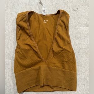 Out from under seamless tank